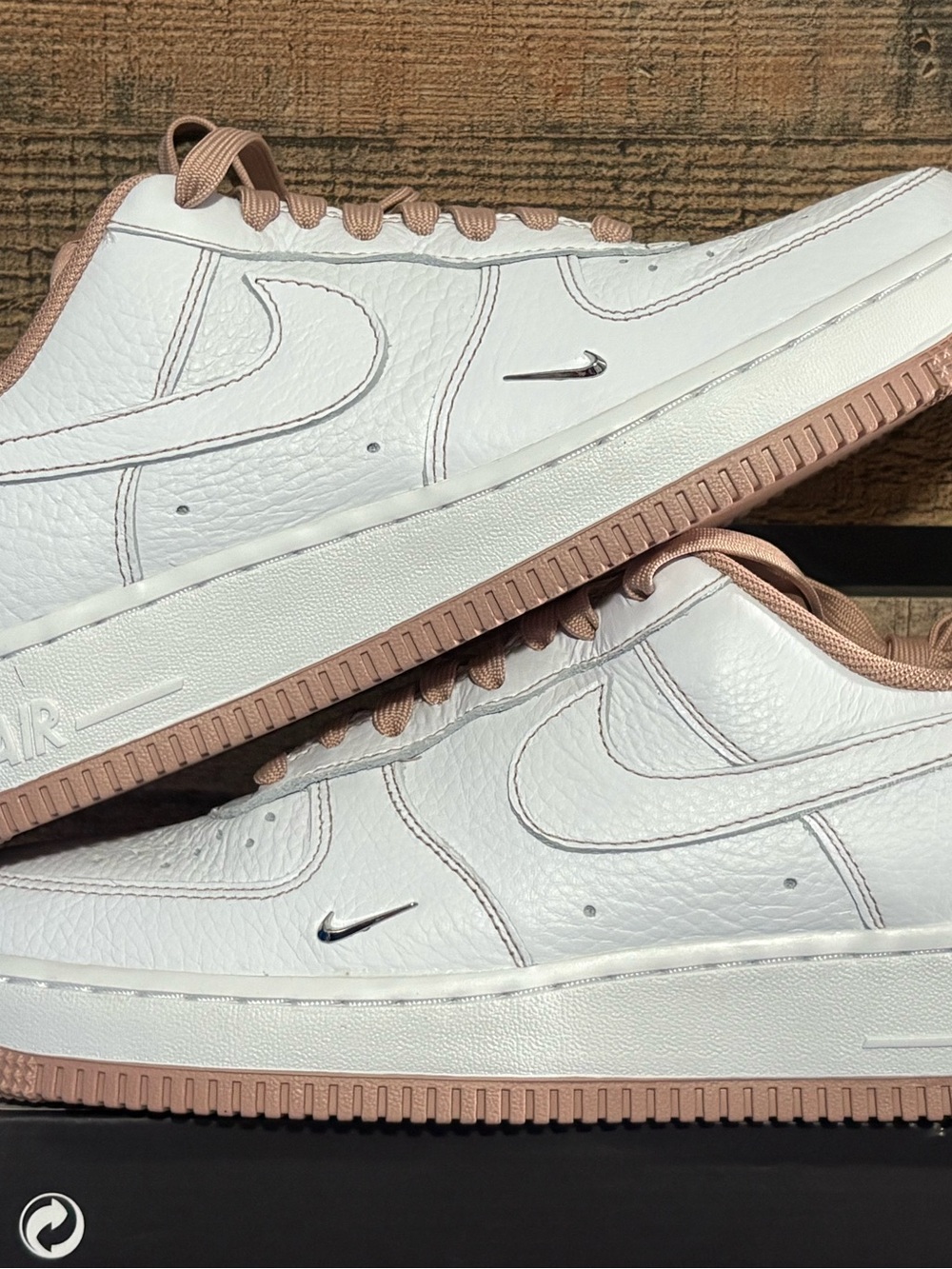 Nike Air Force 1s White Leather Sneakers with Rose Gold Accents